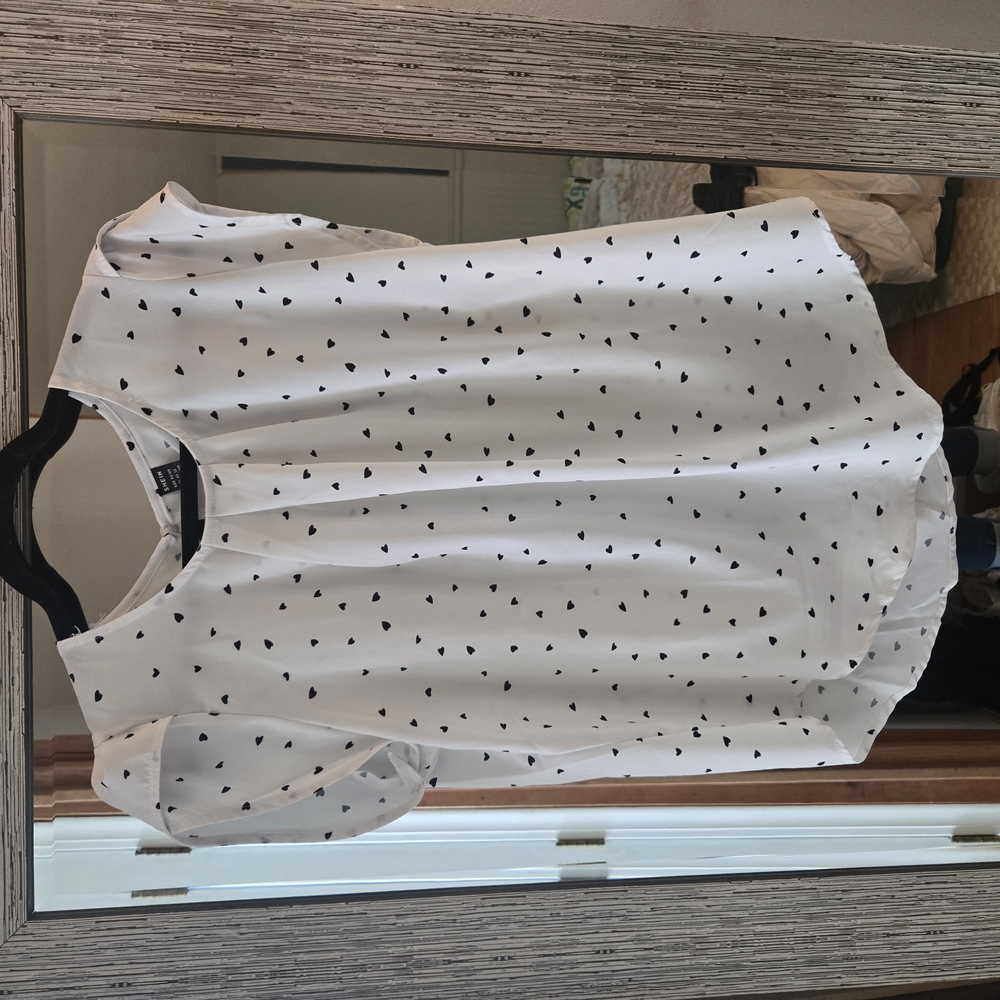 White Sleeveless Top with Black Heart Pattern